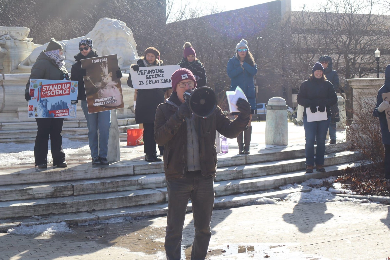 Michael Feigan speaking to demonstrators